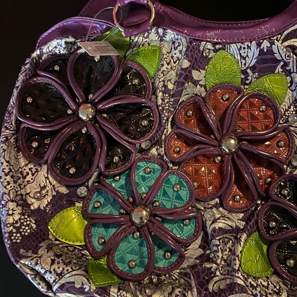 Gorgeous purple purse with with flower embellishments. - Picture 5 of 6